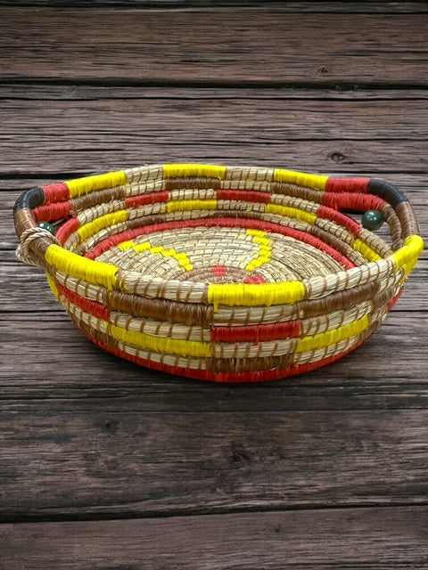 Buffalo Sweetgrass handwoven basket, sunburst design with green beaded handles
