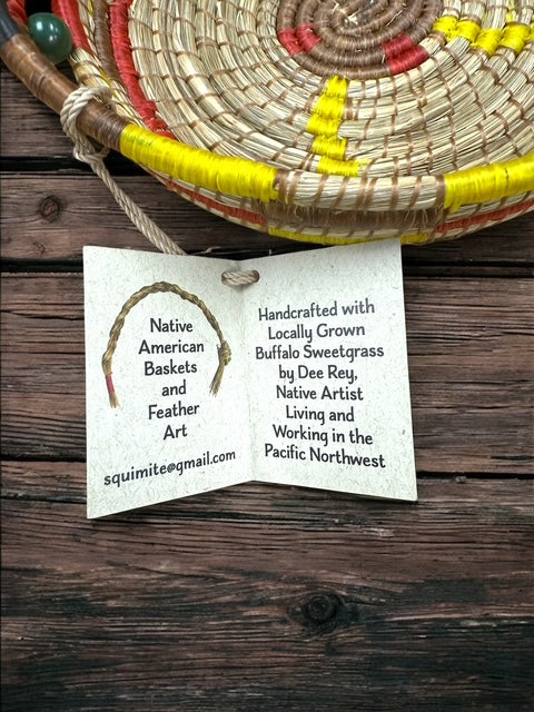 Buffalo Sweetgrass handwoven basket, sunburst design with green beaded handles