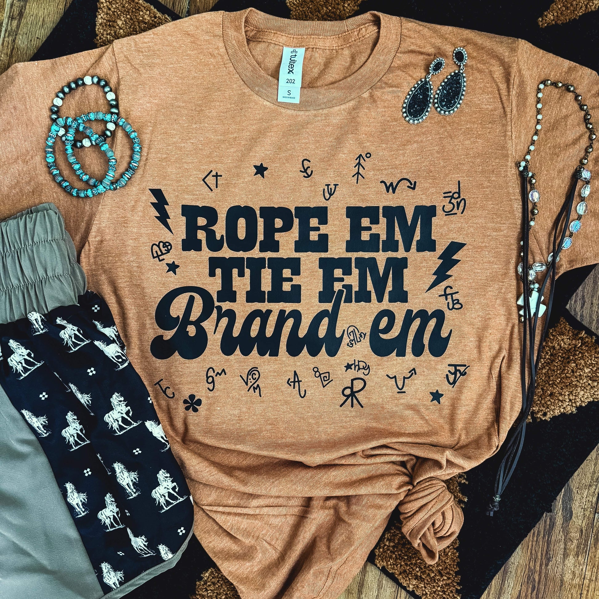 FestiviTees Women - Apparel - Shirts - T-Shirts Rope 'Em Tie 'Em Brand 'Em Soft Graphic Tee