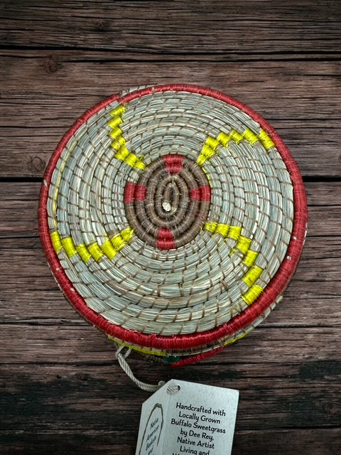 Buffalo Sweetgrass handwoven basket, sunburst design with green beaded handles